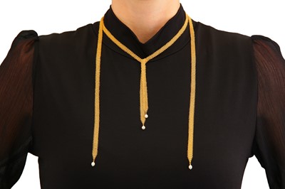 Lot 1 - Elsa Peretti for Tiffany & Co.| A gold and cultured pearl Mesh scarf necklace and earrings