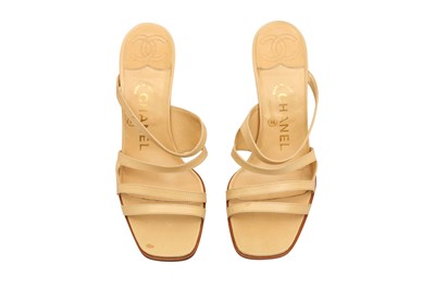 Lot 677 - A PAIR OF CHANEL BEIGE STRAPPY SANDALS