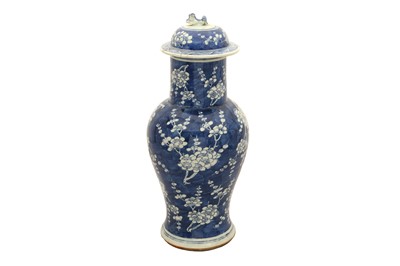 Lot 216 - A CHINESE BLUE AND WHITE PORCELAIN PRUNUS BLOSSOM VASE AND COVER, 19TH CENTURY