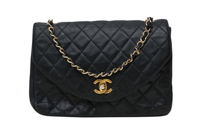 Lot 621 - Chanel Black Round Flap Bag