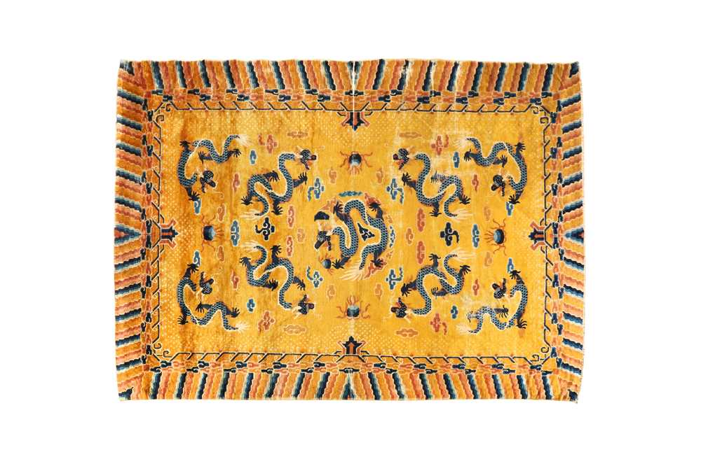 Lot 57 - A RARE CHINESE NINGXIA YELLOW-GROUND 'NINE DRAGON' CARPET