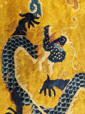 Lot 57 - A RARE CHINESE NINGXIA YELLOW-GROUND 'NINE DRAGON' CARPET