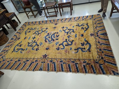 Lot 57 - A RARE CHINESE NINGXIA YELLOW-GROUND 'NINE DRAGON' CARPET