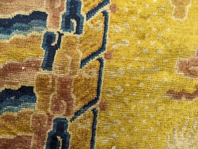 Lot 57 - A RARE CHINESE NINGXIA YELLOW-GROUND 'NINE DRAGON' CARPET