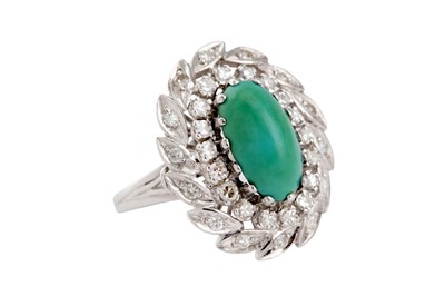 Lot 19 - A turquoise and diamond dress ring