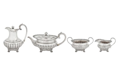 Lot 378 - An Edwardian sterling silver four-piece tea and coffee service, London 1904/09 by messrs Barnard