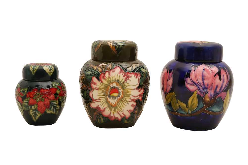 Lot 710 - THREE MOORCROFT POTTERY GINGER JARS