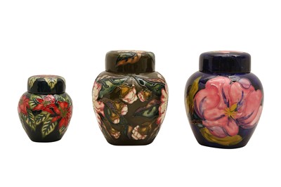 Lot 710 - THREE MOORCROFT POTTERY GINGER JARS