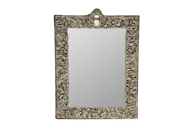 Lot 17 - AN EDWARDIAN STERLING SILVER MOUNTED DRESSING TABLE MIRROR, LONDON 1905 BY GOLDSMITHS AND SILVERSMITHS COMPANY