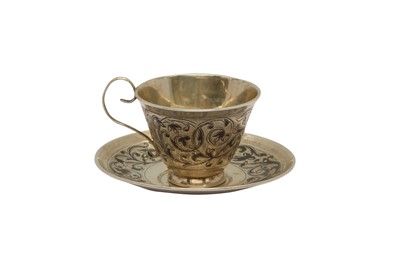 Lot 164 - AN ALEXANDER II RUSSIAN 84 ZOLOTNIK SILVER AND NIELLO CUP AND SAUCER, MOSCOW 1867(?) BY MIKHAIL DMITRIEV