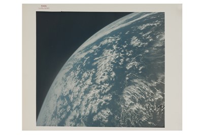 Lot 73 - Four views of Earth from space including a spectacular view of the curvature of Earth