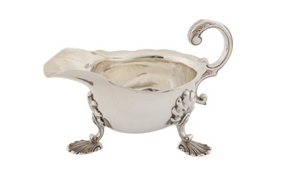 Lot 252 - A VICTORIAN SCOTTISH STERLING SILVER SAUCE BOAT, GLASGOW 1884 BY R D AND S (ROBERT DRUMMOND?)