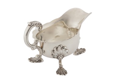 Lot 252 - A VICTORIAN SCOTTISH STERLING SILVER SAUCE BOAT, GLASGOW 1884 BY R D AND S (ROBERT DRUMMOND?)
