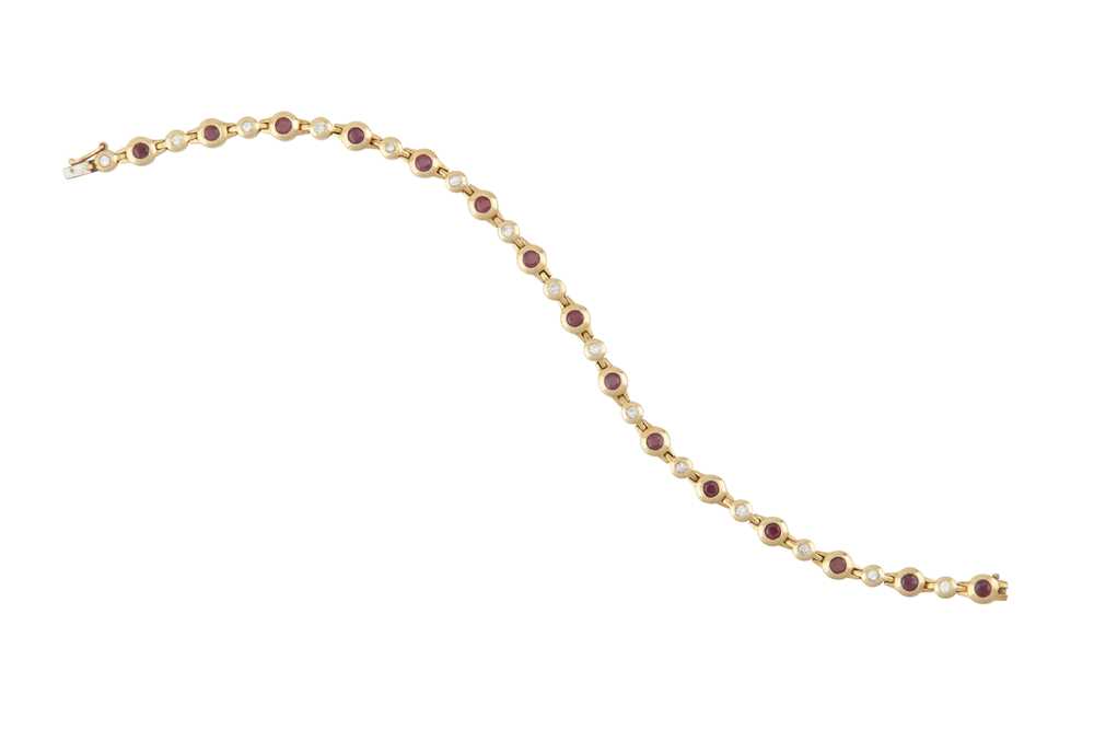 Lot 444 - A RUBY AND DIAMOND LINE BRACELET