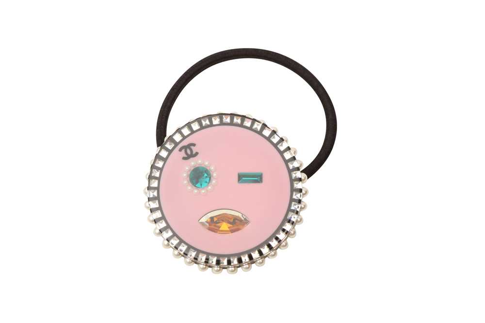 Lot 245 - Chanel Pink CC Logo Emoji Resin Hairband