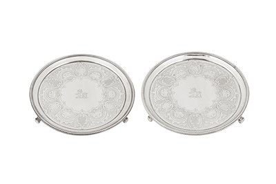 Lot 386 - A pair of Victorian sterling silver waiters, London 1854 by William Moulson