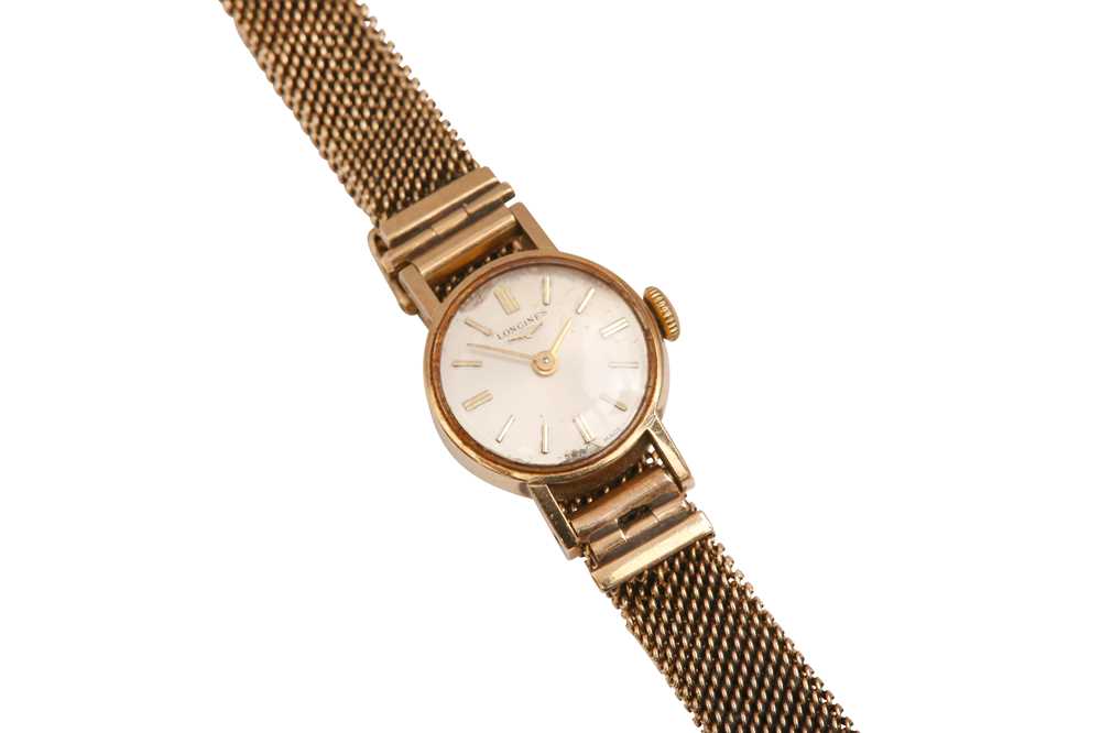 Lot 358 - A LADIES 9K GOLD LONGINES BRACELET WATCH