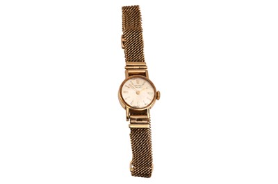 Lot 358 - A LADIES 9K GOLD LONGINES BRACELET WATCH