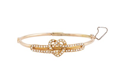 Lot 33 - A BANGLE SET WITH SEED PEARLS