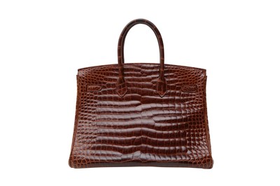 Lot 468 - λ Hermes Shiny Miel Porosus Crocodile Birkin 35