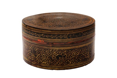 Lot 386 - A BURMESE RED AND BLACK LACQUER 'MYTHICAL CREATURE' BETEL-BOX AND COVER