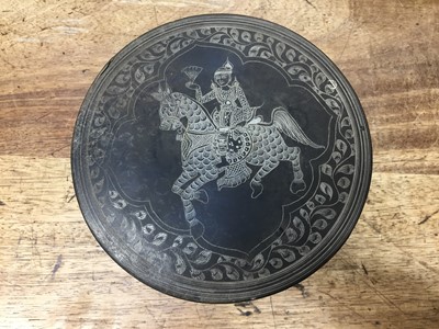 Lot 381 - A BURMESE INCISED BLACK LACQUER 'EQUESTRIAN' BETEL-BOX AND COVER