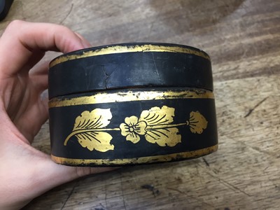 Lot 374 - A SMALL BURMESE GILDED BLACK LACQUER 'PEACOCK' BOX AND COVER