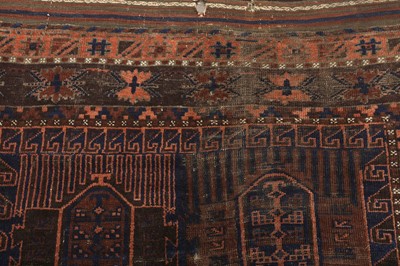 Lot 32 - A BALOUCH RUG, NORTH-EAST PERSIA