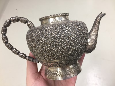 Lot 411 - A MALAY/THAI SILVER TEAPOT AND COVER