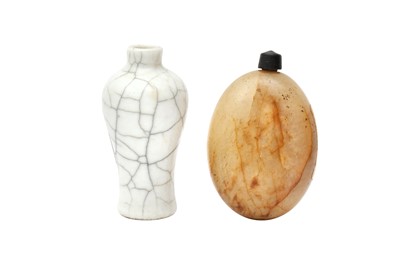 Lot 821 - A CHINESE CRACKLE-GLAZED SNUFF BOTTLE TOGETHER WITH A HARDSTONE SNUFF BOTTLE