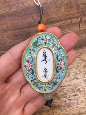 Lot 595 - A CHINESE FAMILLE-ROSE TURQUOISE-GROUND 'ABSTINENCE' PLAQUE