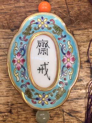 Lot 595 - A CHINESE FAMILLE-ROSE TURQUOISE-GROUND 'ABSTINENCE' PLAQUE
