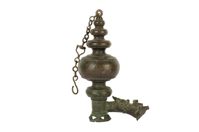 Lot 279 - AN INDIAN BRONZE HANGING OIL LAMP WITH MAKARA SPOUT