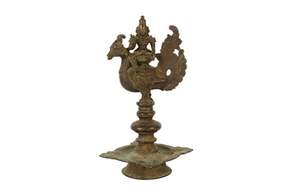 Lot 277 - A FINE SOUTH INDIAN BRONZE OIL LAMP WITH A HINDU GODDESS SEATED ON A HAMSA BIRD