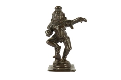 Lot 276 - A DEVOTIONAL BRONZE FIGURINE OF BABY KRISHNA DANCING