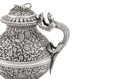 Lot 228 - A fine late 19th century Anglo – Indian silver teapot, Cutch, Bhuj circa 1880 by Oomersi Mawji (active 1860-90)