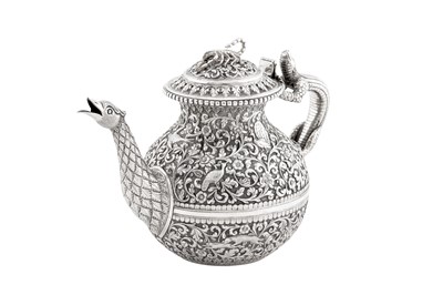 Lot 228 - A fine late 19th century Anglo – Indian silver teapot, Cutch, Bhuj circa 1880 by Oomersi Mawji (active 1860-90)