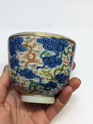 Lot 129 - A PAIR OF CHINESE FAMILLE-ROSE 'DRAGON' CUPS