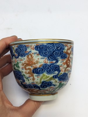 Lot 129 - A PAIR OF CHINESE FAMILLE-ROSE 'DRAGON' CUPS