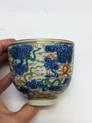 Lot 129 - A PAIR OF CHINESE FAMILLE-ROSE 'DRAGON' CUPS