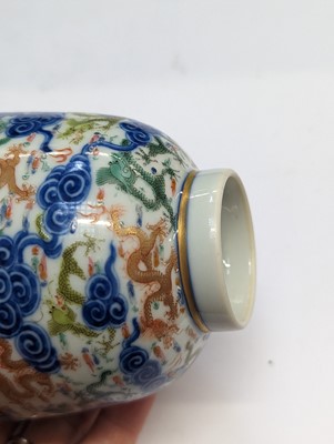 Lot 129 - A PAIR OF CHINESE FAMILLE-ROSE 'DRAGON' CUPS