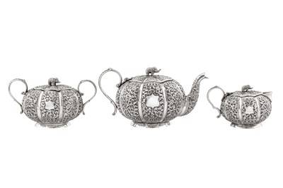 Lot 219 - A late 19th century Anglo – Indian unmarked silver three-piece bachelor tea service, Cutch circa 1890