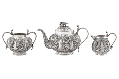 Lot 125 - An assembled late 19th / early 20th century Anglo – Indian unmarked silver three-piece tea service, Lucknow circa 1900