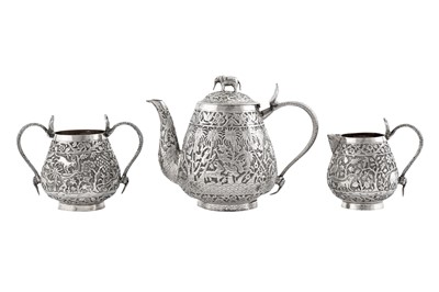 Lot 124 - An assembled late 19th / early 20th century Anglo – Indian unmarked silver three-piece tea service, Lucknow circa 1900