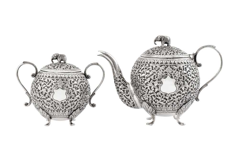 Lot 217 - An early 20th century Anglo – Indian unmarked silver part- tea service, Cutch circa 1900