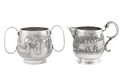 Lot 62 - A late 19th / early 20th century Anglo – Indian silver milk jug, Calcutta, Bhowanipore circa 1900 by Grish Chunder Dutt
