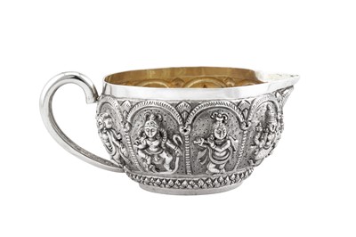 Lot 47 - A late 19th century Anglo – Indian silver milk jug, Madras dated 1893