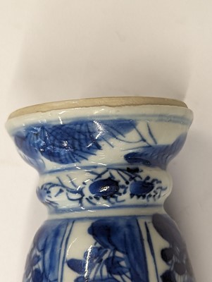 Lot 219 - A SMALL CHINESE BLUE AND WHITE BEAKER VASE