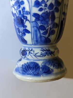 Lot 219 - A SMALL CHINESE BLUE AND WHITE BEAKER VASE