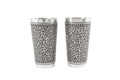 Lot 200 - A pair of large early 20th century Anglo – Indian silver beakers, Bombay - Cutch circa 1920